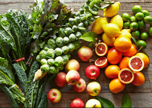 a group of fruits and vegetables on a wood surface Healthy Weight Loss Diets Salisbury